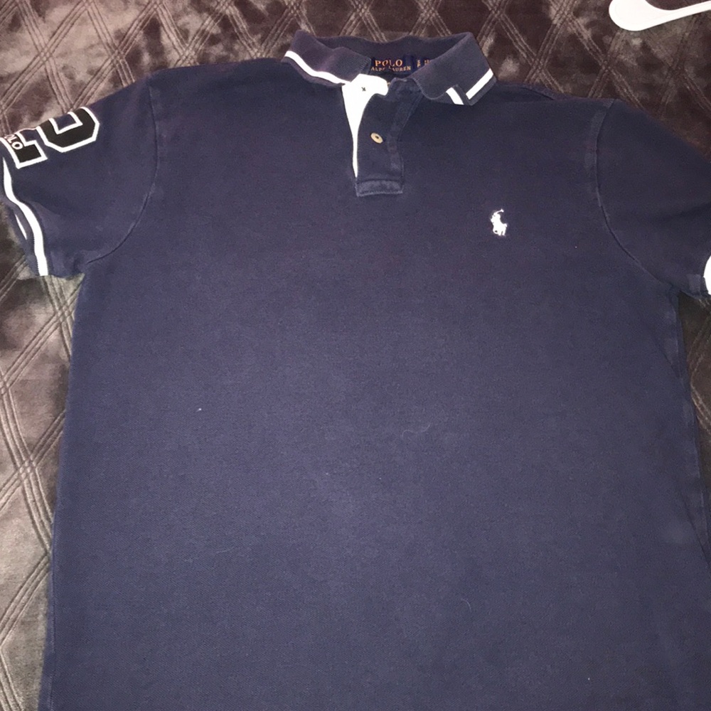 A blue navy polo shirt